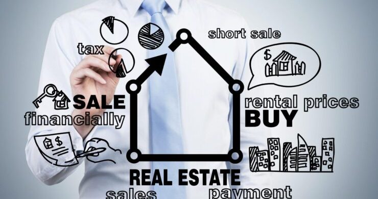 businessman drawing real estate concept on blue background